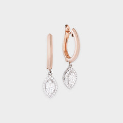 Rose gold hoop earrings with diamond drop pendants on a light gray background