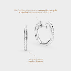 Pair of hoop earrings with diamond accents on a light gray background