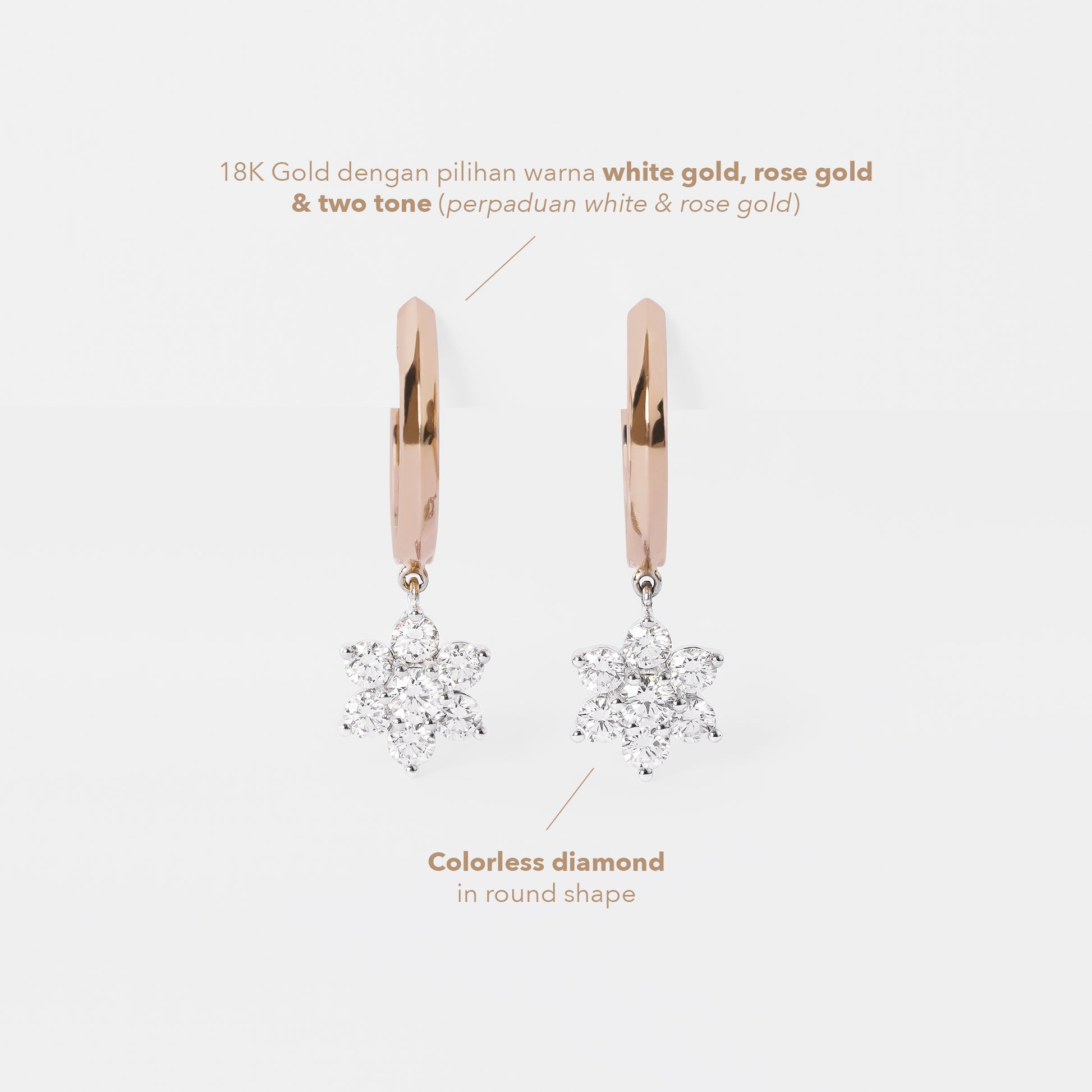 Rose gold hoop earrings with diamond snowflake pendants on a light gray background