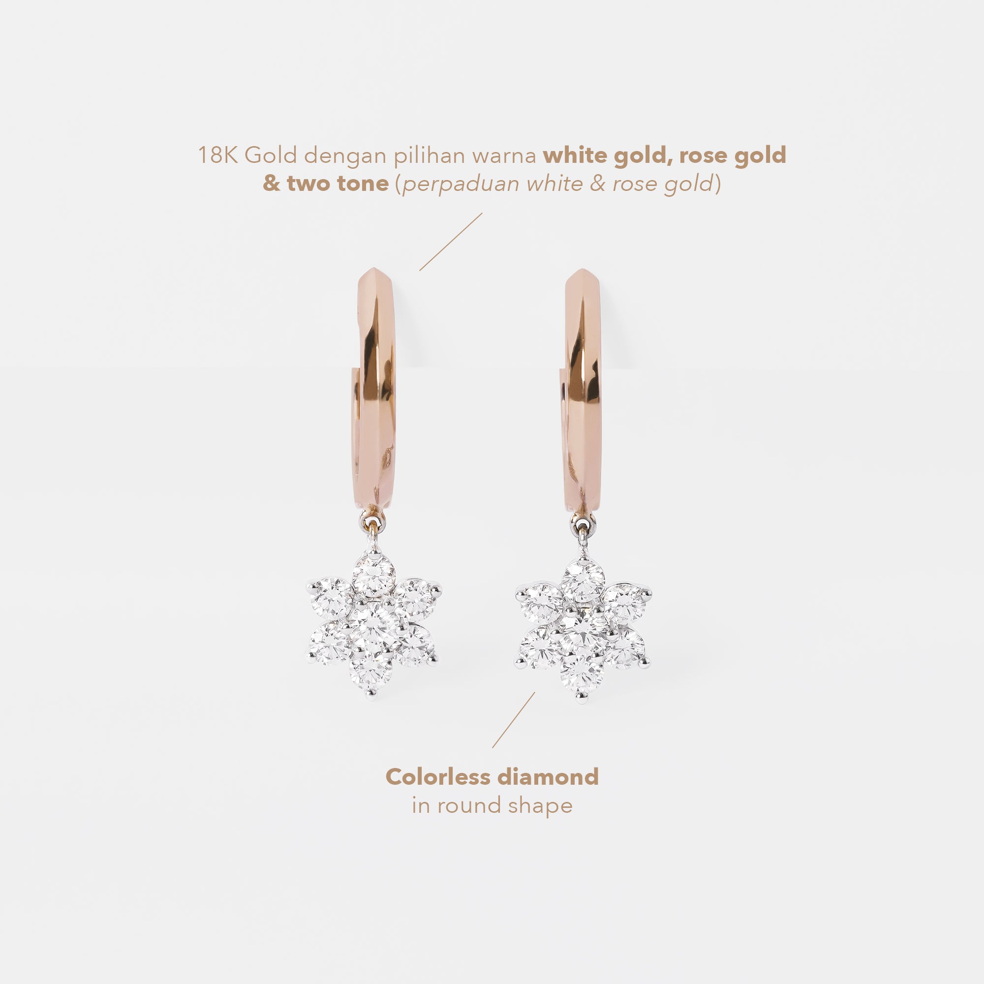 Rose gold hoop earrings with diamond snowflake pendants on a light gray background